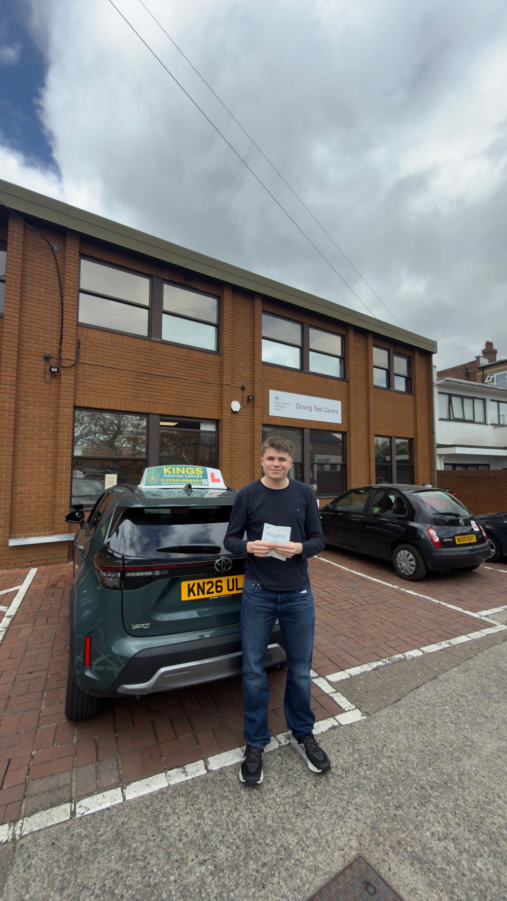 Learner celebrating outside the test centre
